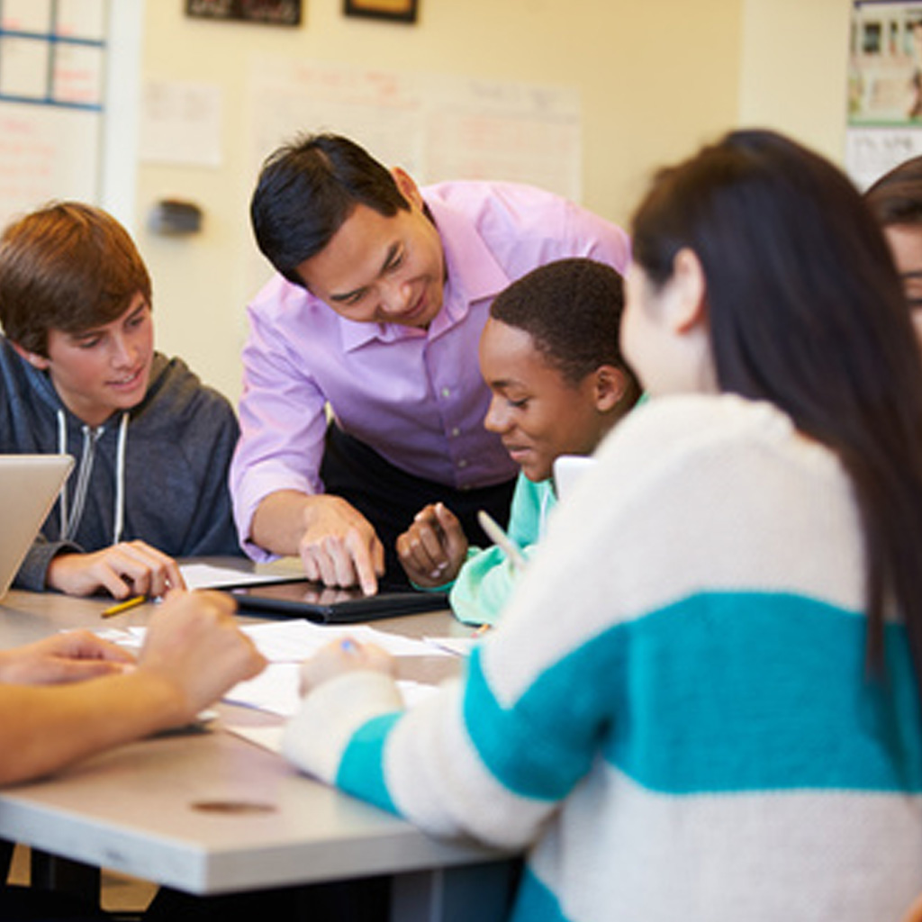 Teachers with students